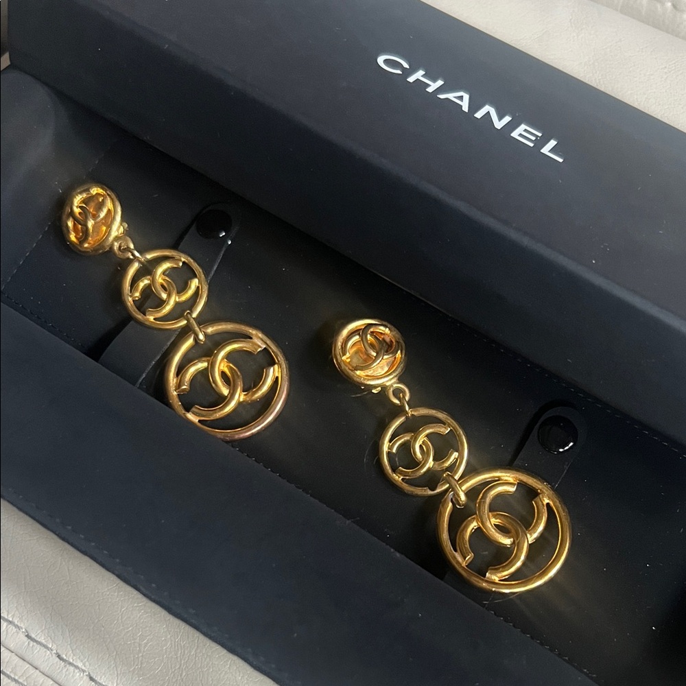 vintage CHANEL Gold Logo Dangle Clip On Earrings